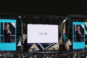 A mesmerizing outdoor LED video screen serving as a striking backdrop at the Google Summit, enhancing the event with vibrant visuals and an immersive atmosphere