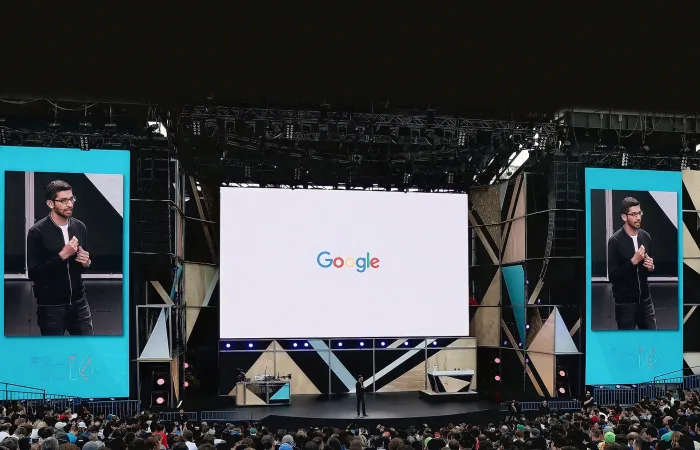 A mesmerizing outdoor LED video screen serving as a striking backdrop at the Google Summit, enhancing the event with vibrant visuals and an immersive atmosphere